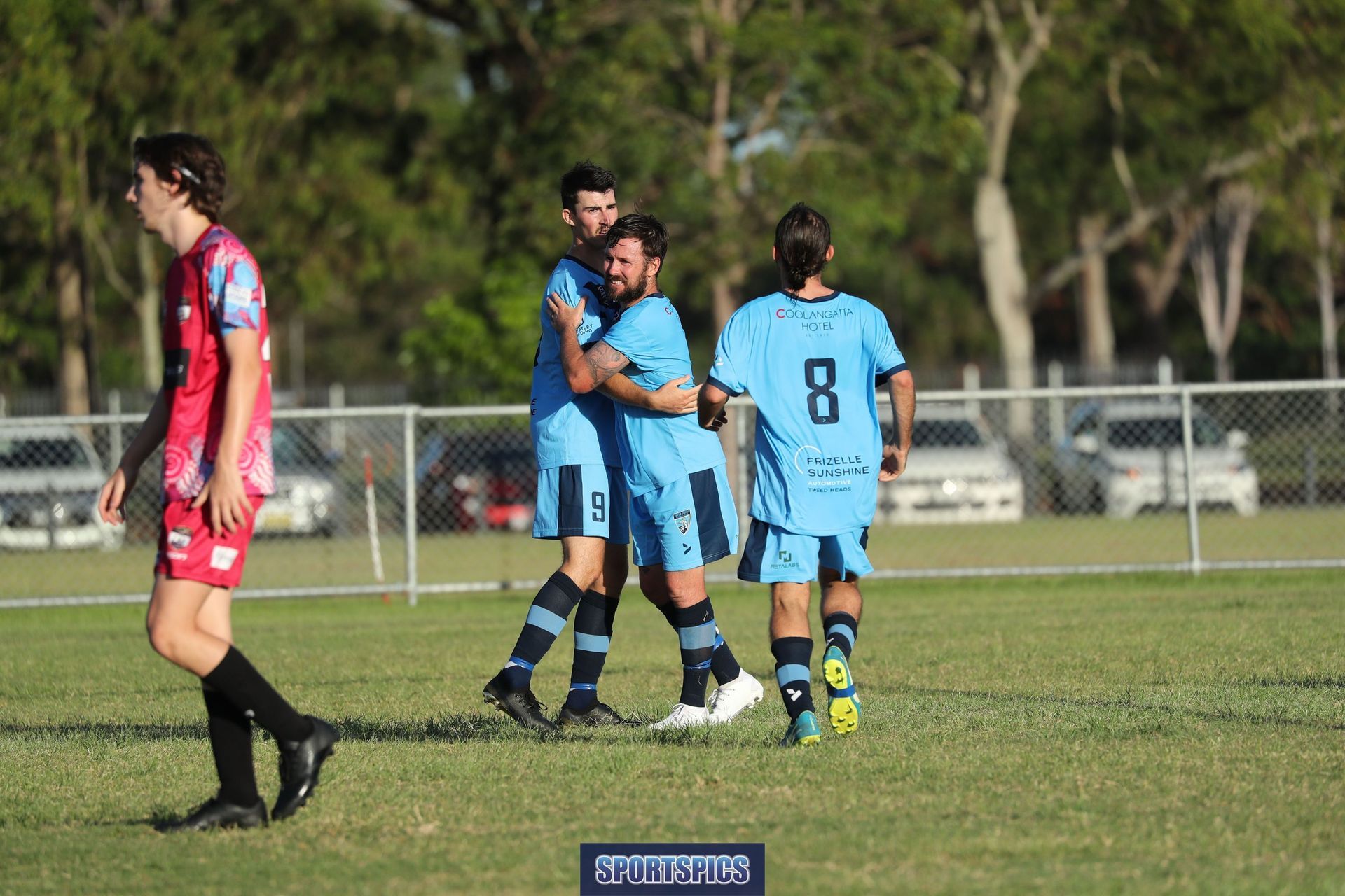tweed united footballers celebrating a goal