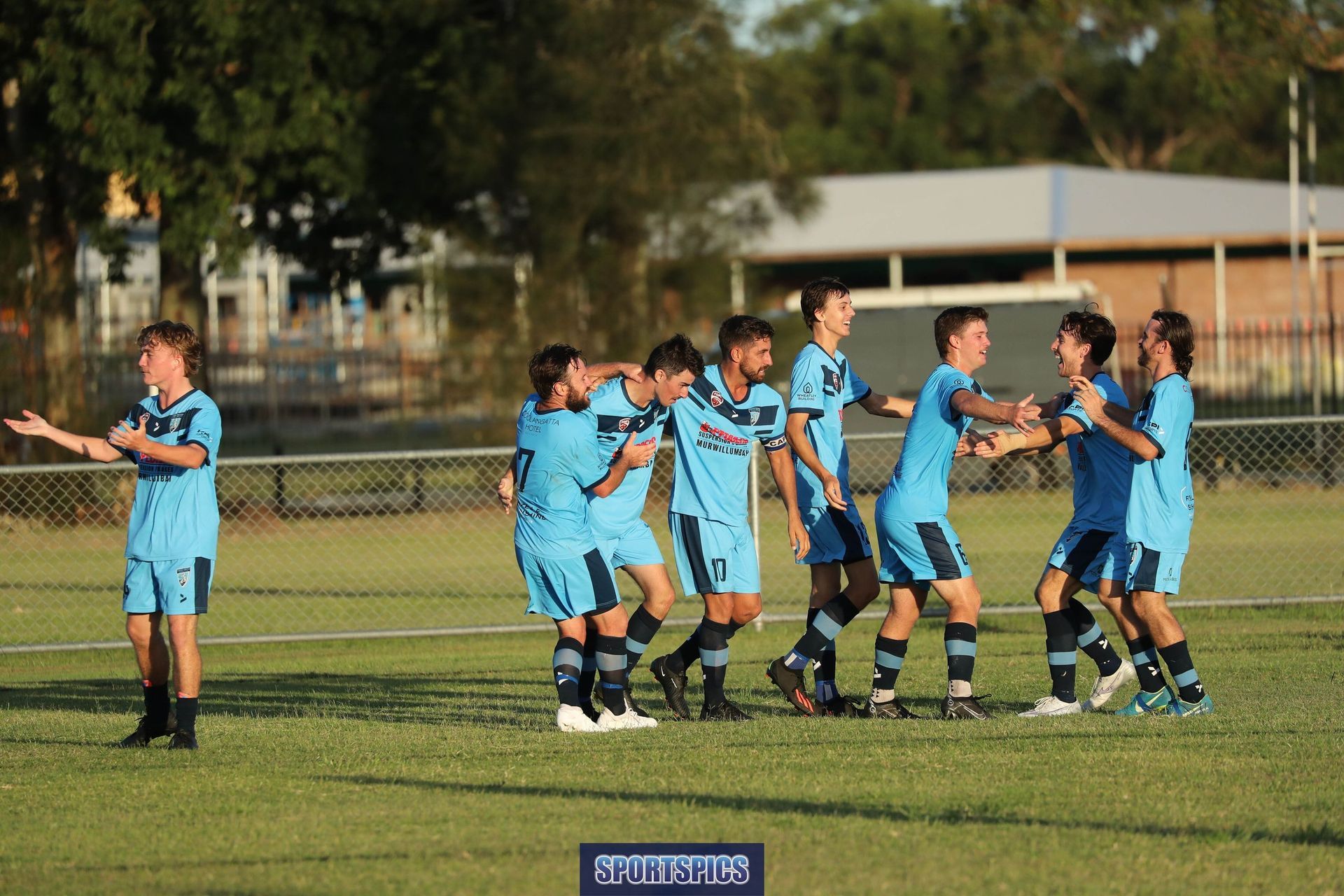 tweed united footballers celebrating a goal