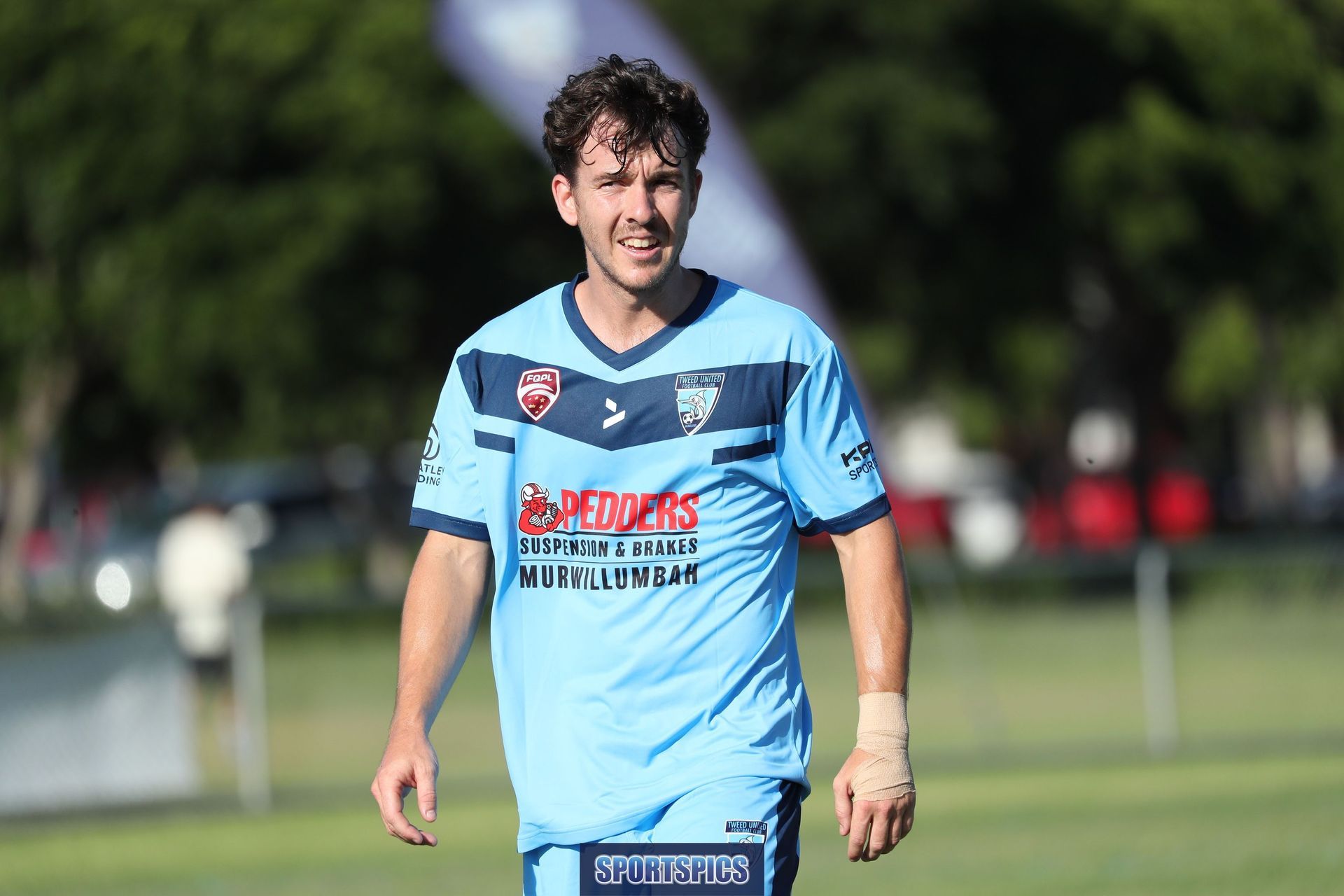 tweed united footballer looking around