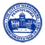 Blue circular university seal with a campus building and surrounding text.