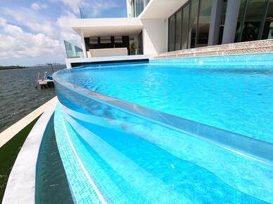 Certified Swimming Pool inspector in Miami performing a high end swimming  pool inspection