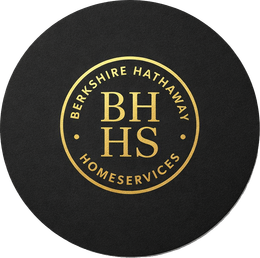 Circular logo for Berkshire Hathaway HomeServices: gold text on black. 