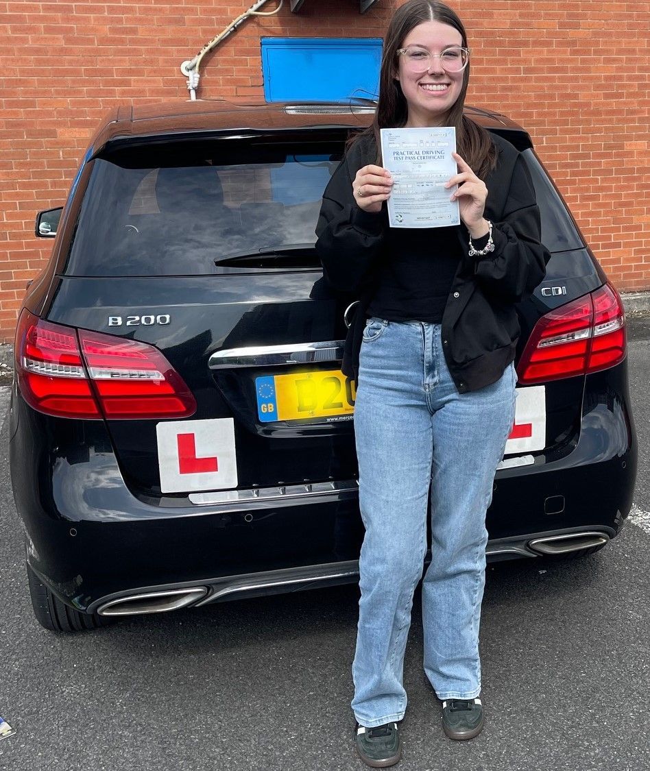 Smiling, happy successful student.