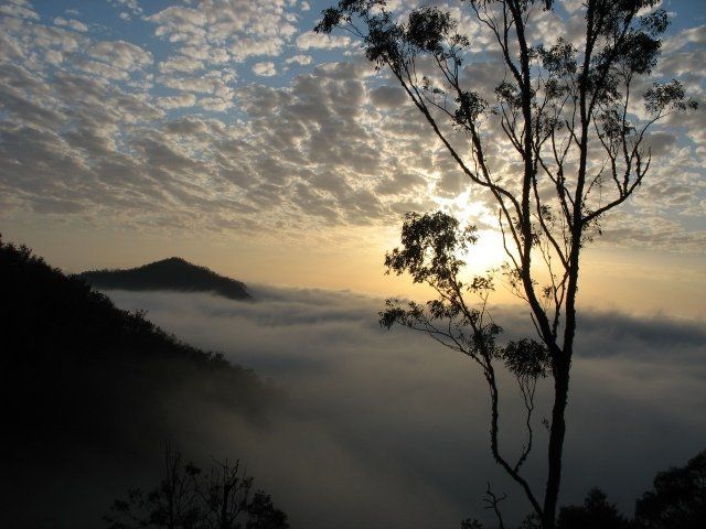 Sunrise with fog and clouds