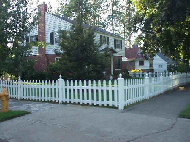 White picket fence that is PVC material