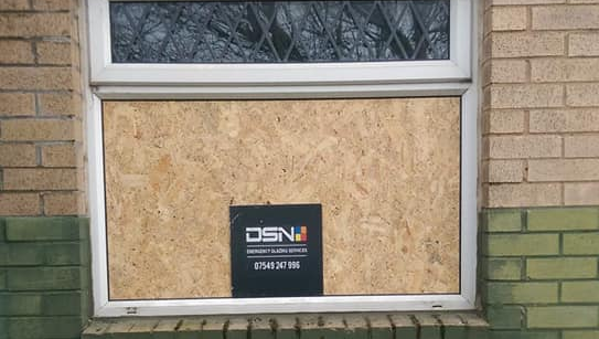 boarded up residential window