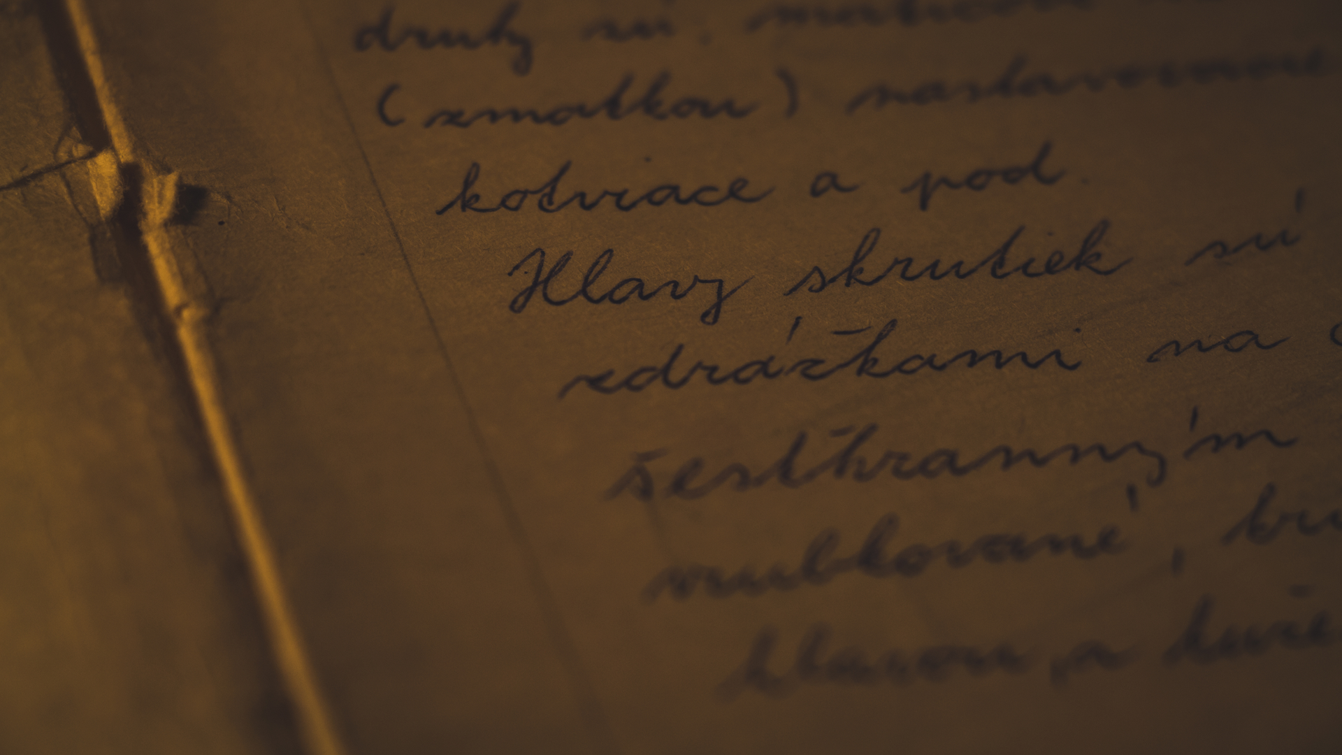 A close up of a book with handwriting on it.