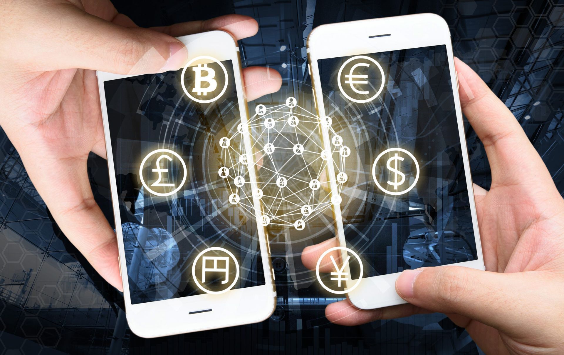 A person is holding two phones in their hands with currency symbols on them.