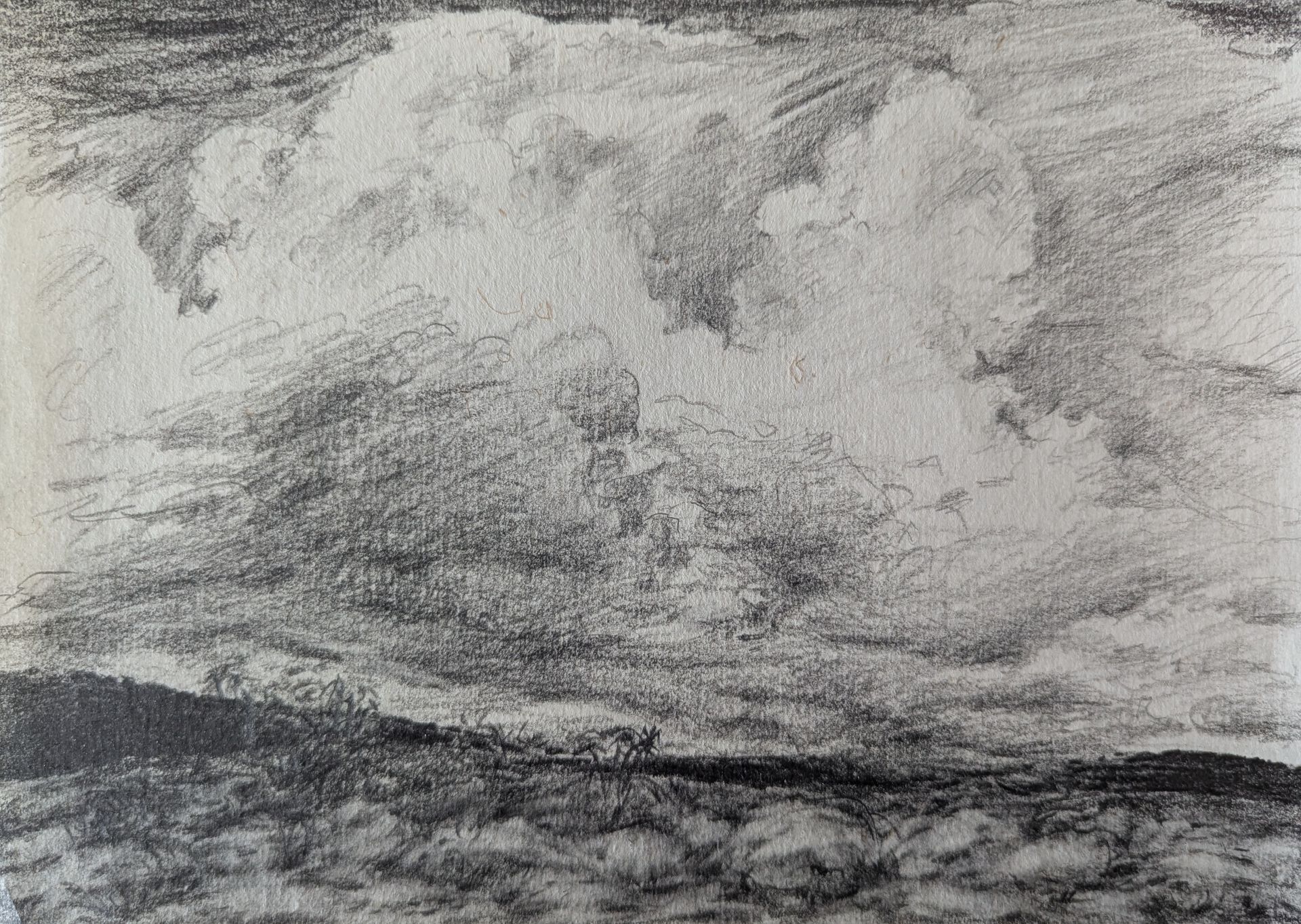 Charcoal drawing of a cloudy sky over a dark landscape with a distant horizon.