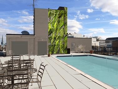 An artist 's impression of a swimming pool on the roof of a building