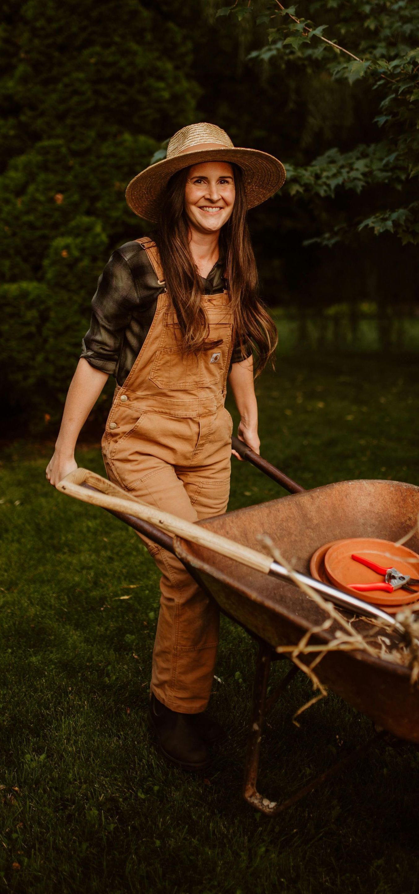 woman pushing a wheelbarrow