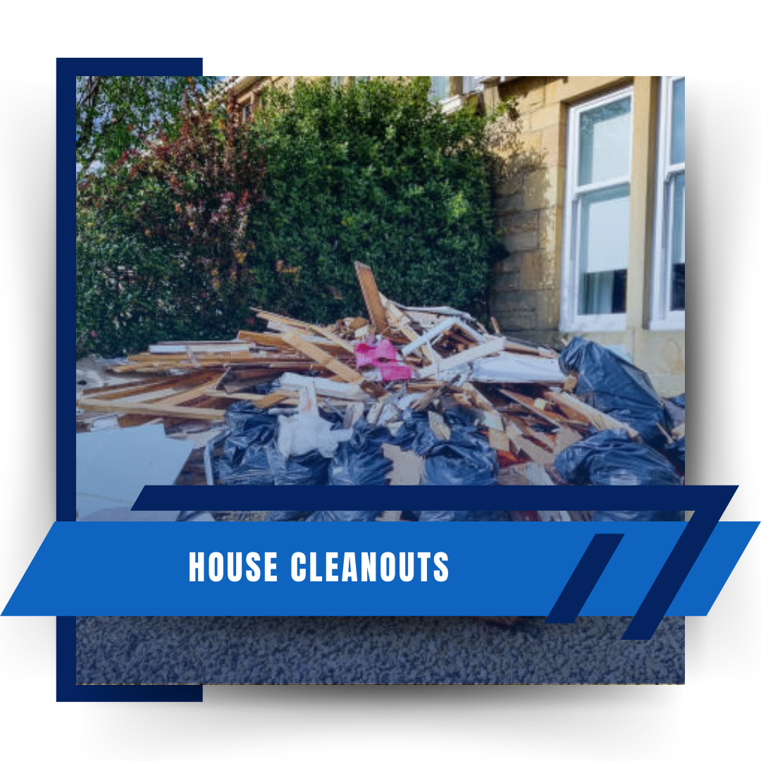 A pile of wood and trash bags in front of a house with blue banner and texts in the foreground.