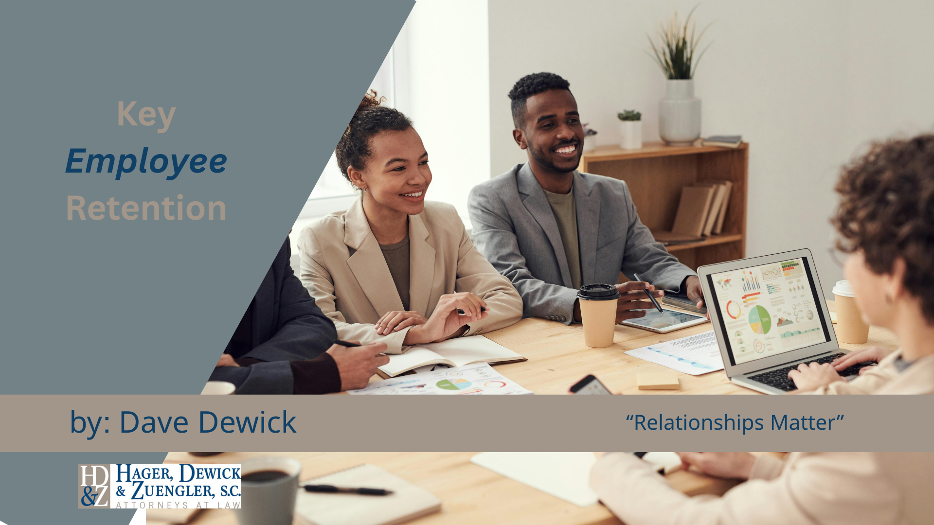 People at a table, discussing employee retention, smiling. 