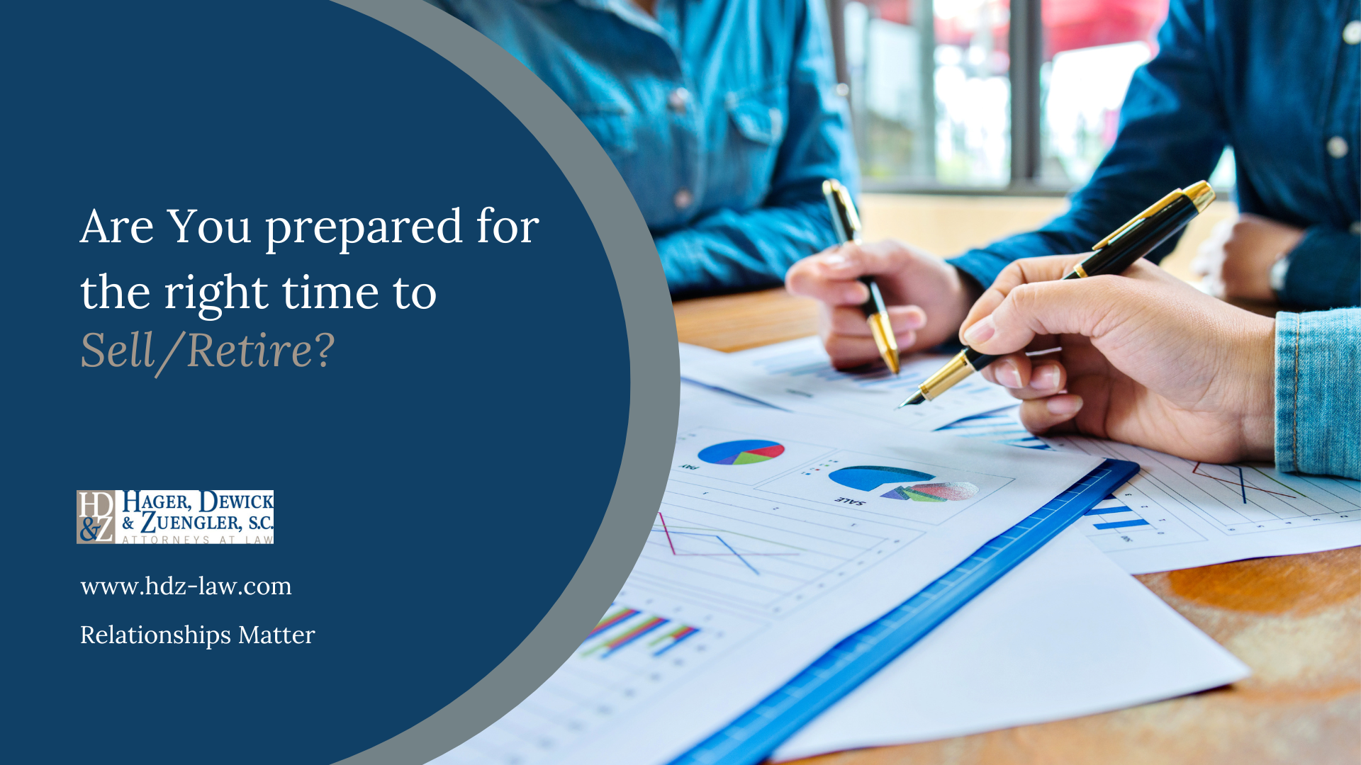 People reviewing paperwork; text: 