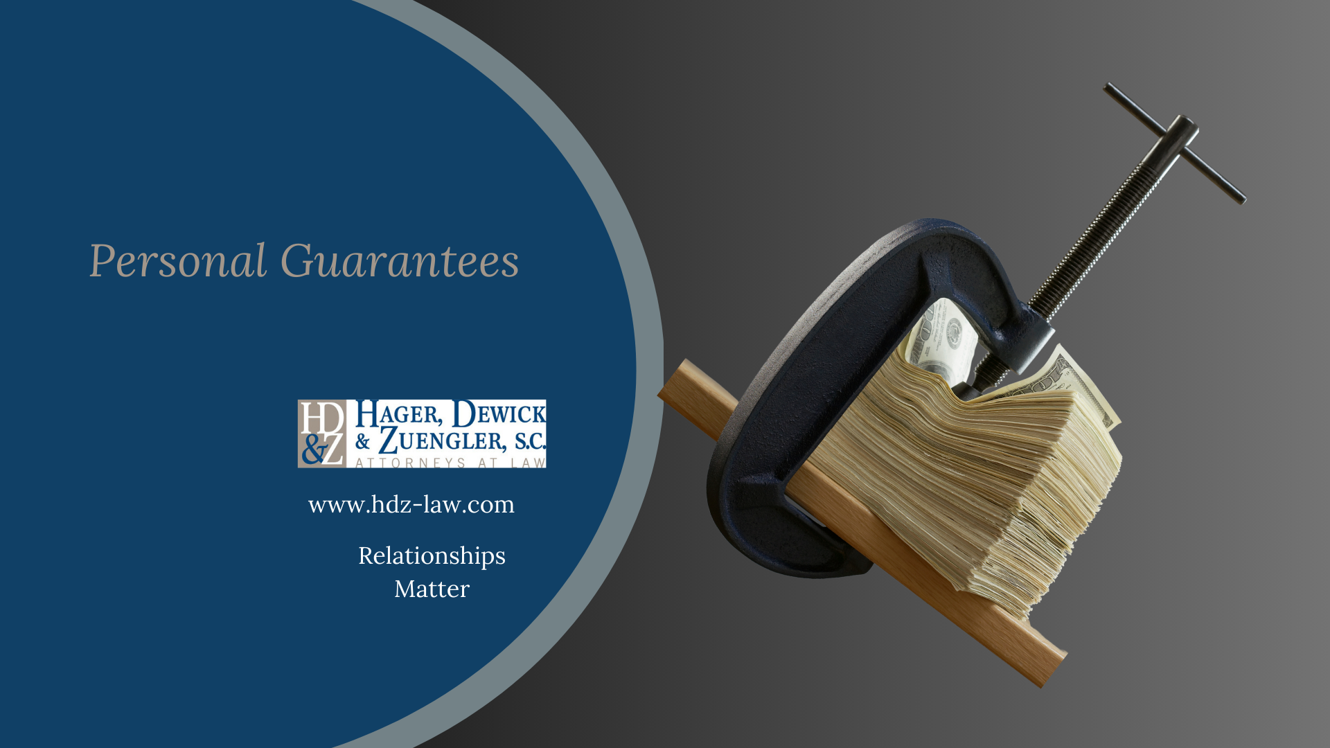 A clamp compressing a stack of cash; the text 