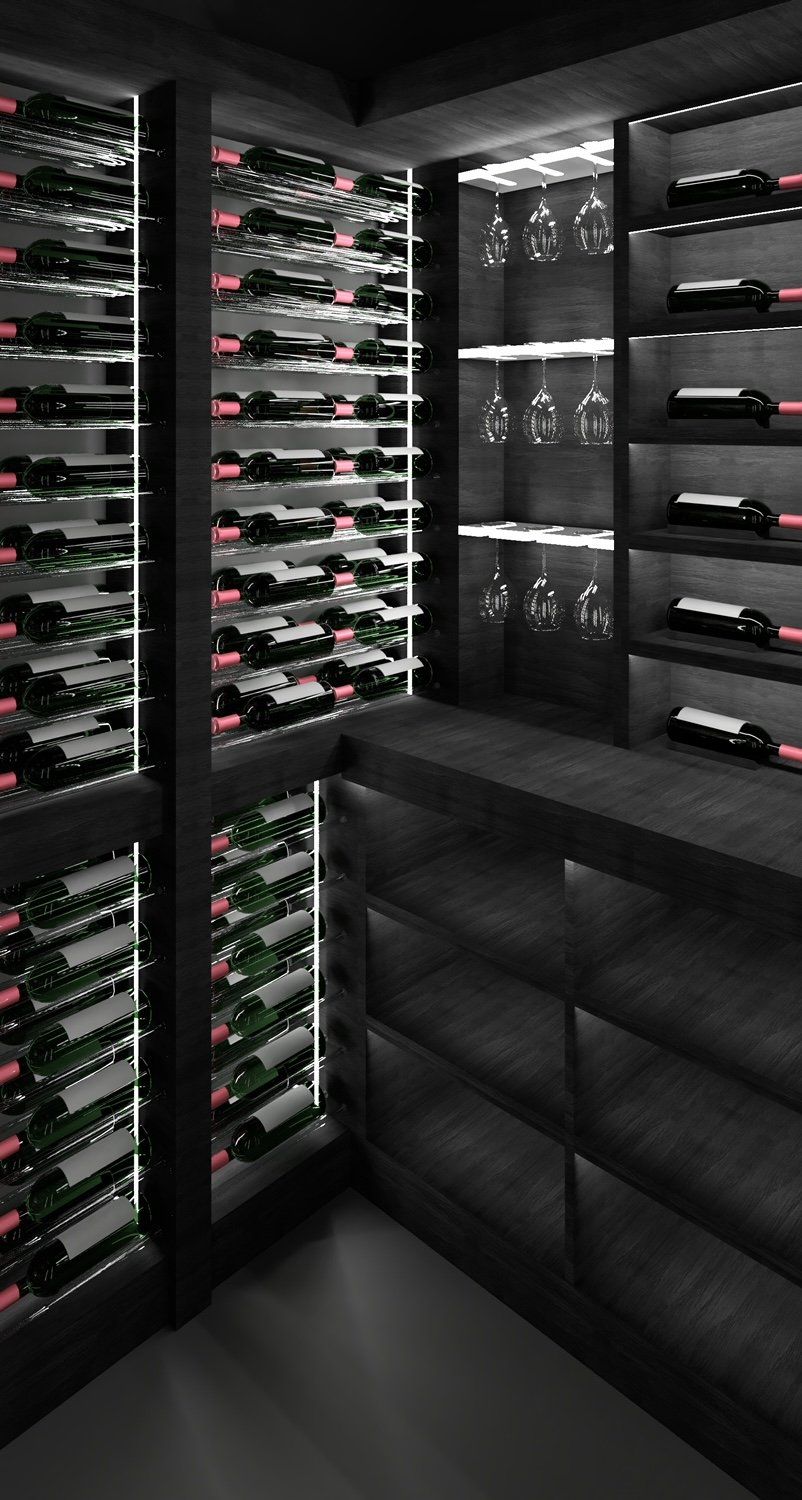 A wine cellar filled with lots of bottles of wine and glasses.