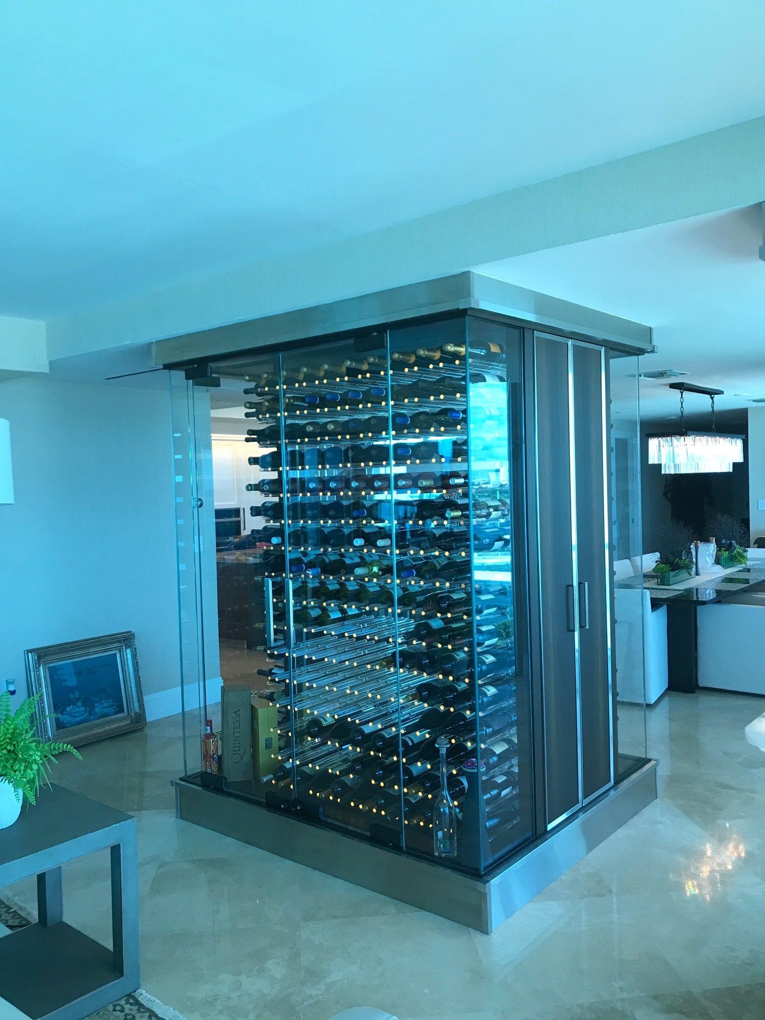 There is a large wine cellar in the middle of the room.