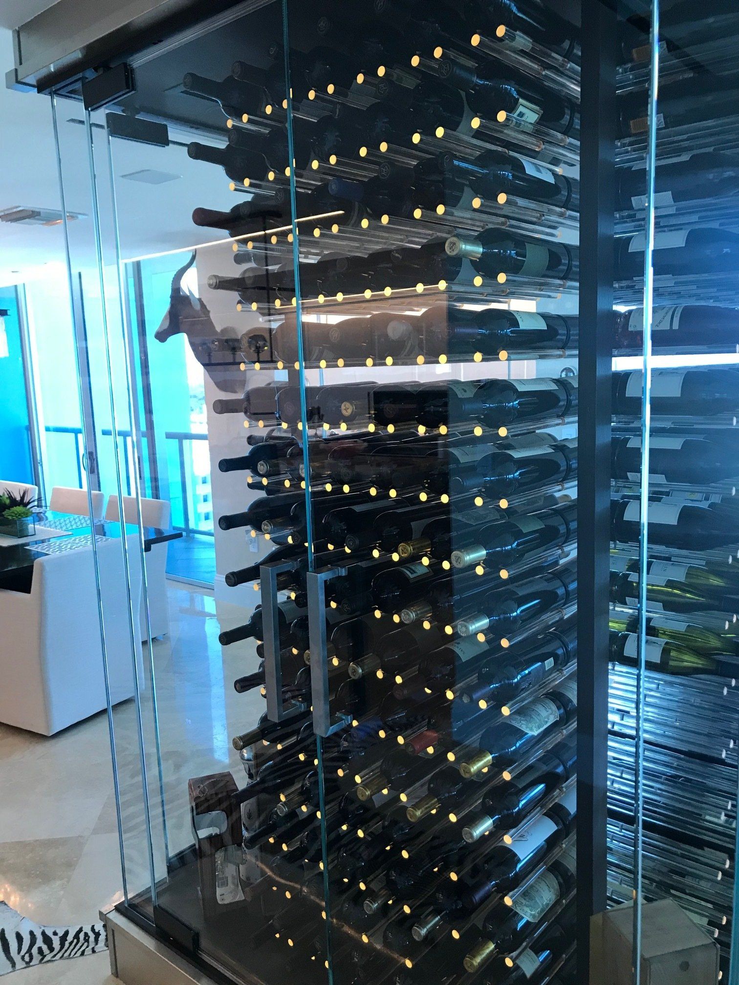 A wine cellar filled with lots of bottles of wine