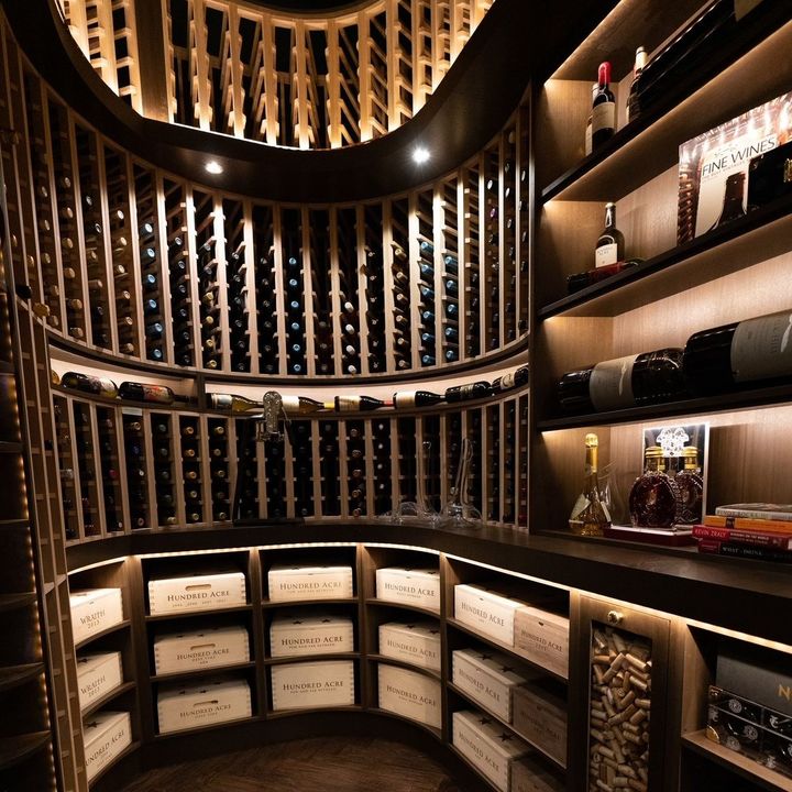 A wine cellar filled with lots of wine bottles