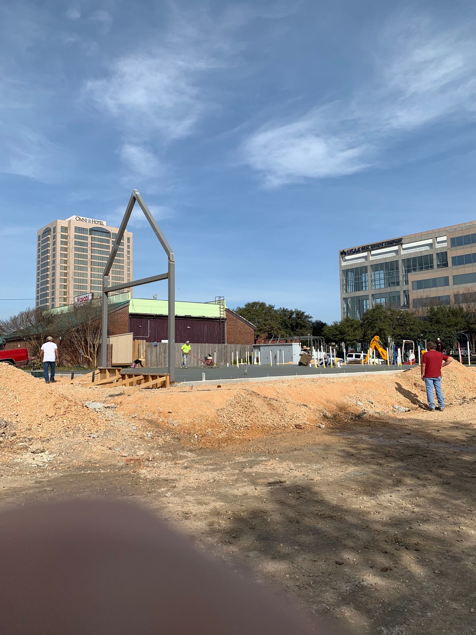 Build by Tuf construction site with foundation and metal framing