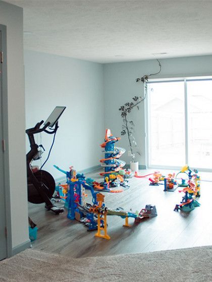 A room with a lot of toys on the floor - Omaha, NE - BluePrint Construction