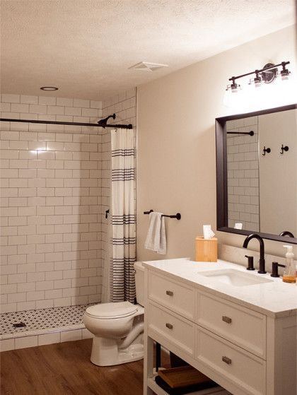 A bathroom with a toilet - Omaha, NE - BluePrint Construction