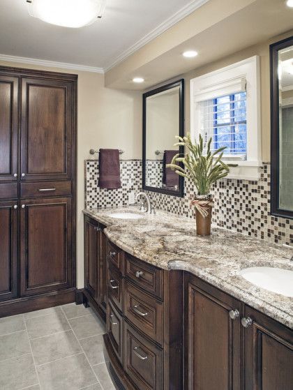 A bathroom with two sinks and two mirrors - Omaha, NE - BluePrint Construction
