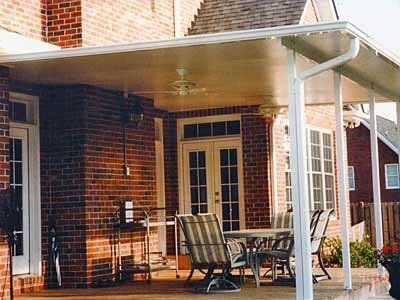 Covered Porch with a Table and Chairs — Greenville, SC — Greenville Aluminum