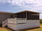 Screened in the  Porch and Stairs — Greenville, SC — Greenville Aluminum