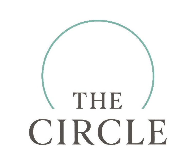 Ein Schild mit der Aufschrift „Wir wimpern Bellevue“ mit Herz und Feder.