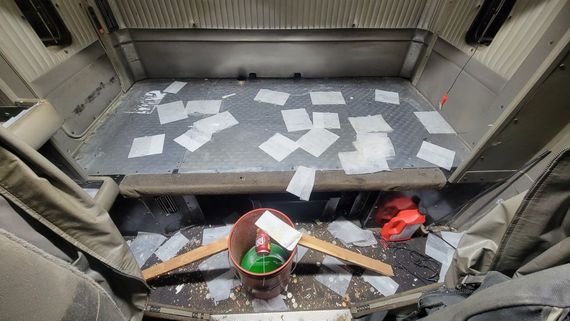 A room with a lot of papers on the floor