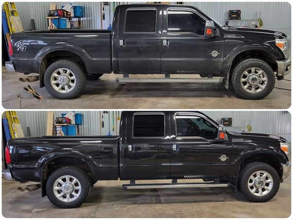 A black pickup truck is shown before and after being lifted.