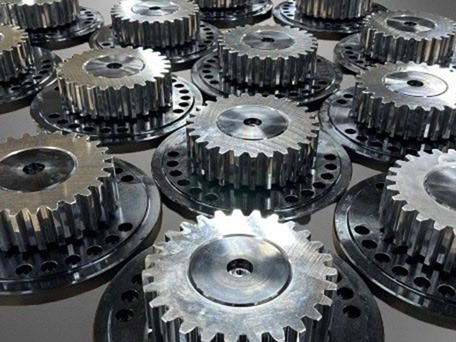 A bunch of metal gears are stacked on top of each other