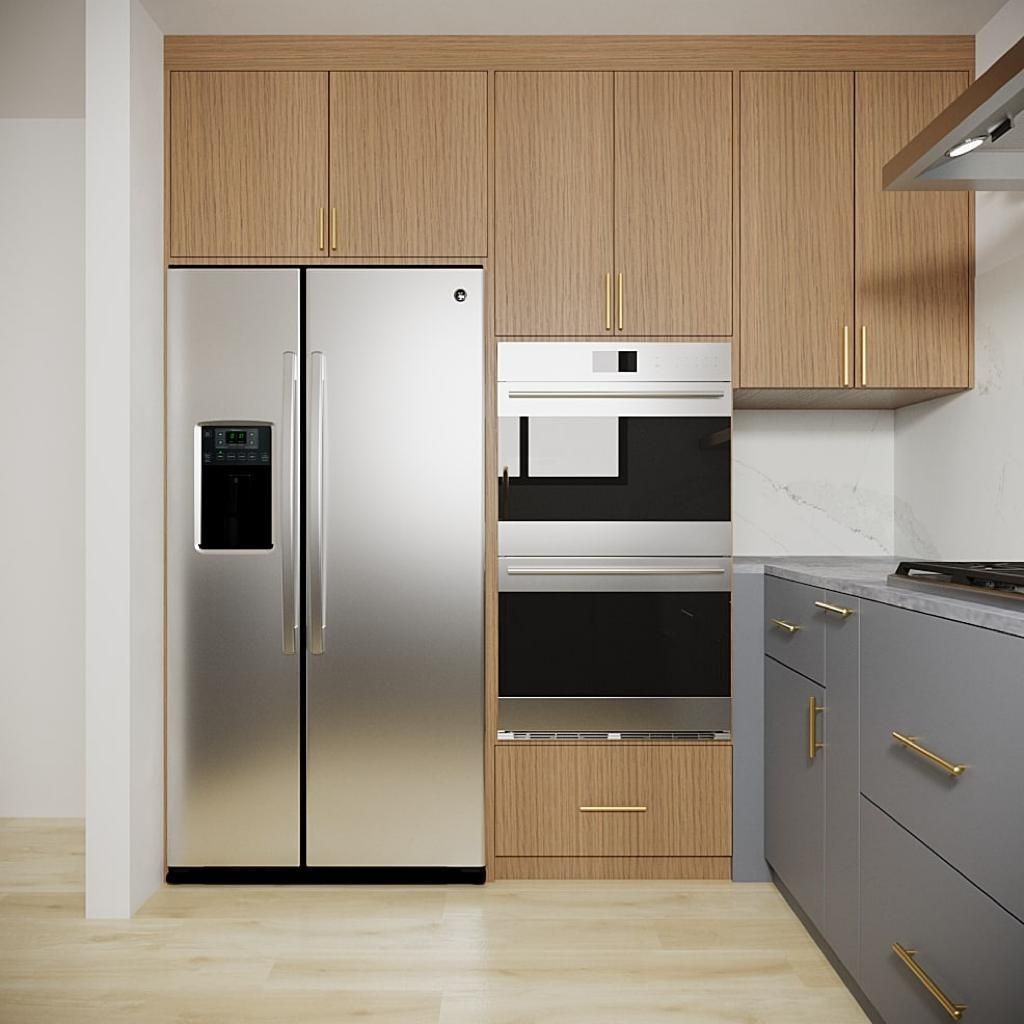 A kitchen renovation site with an island, cabinets, and exposed wall studs, featuring a unfinished, debris-filled room. A kitchen renovation site with an island, cabinets, and exposed wall studs, featuring a unfinished, debris-filled room.