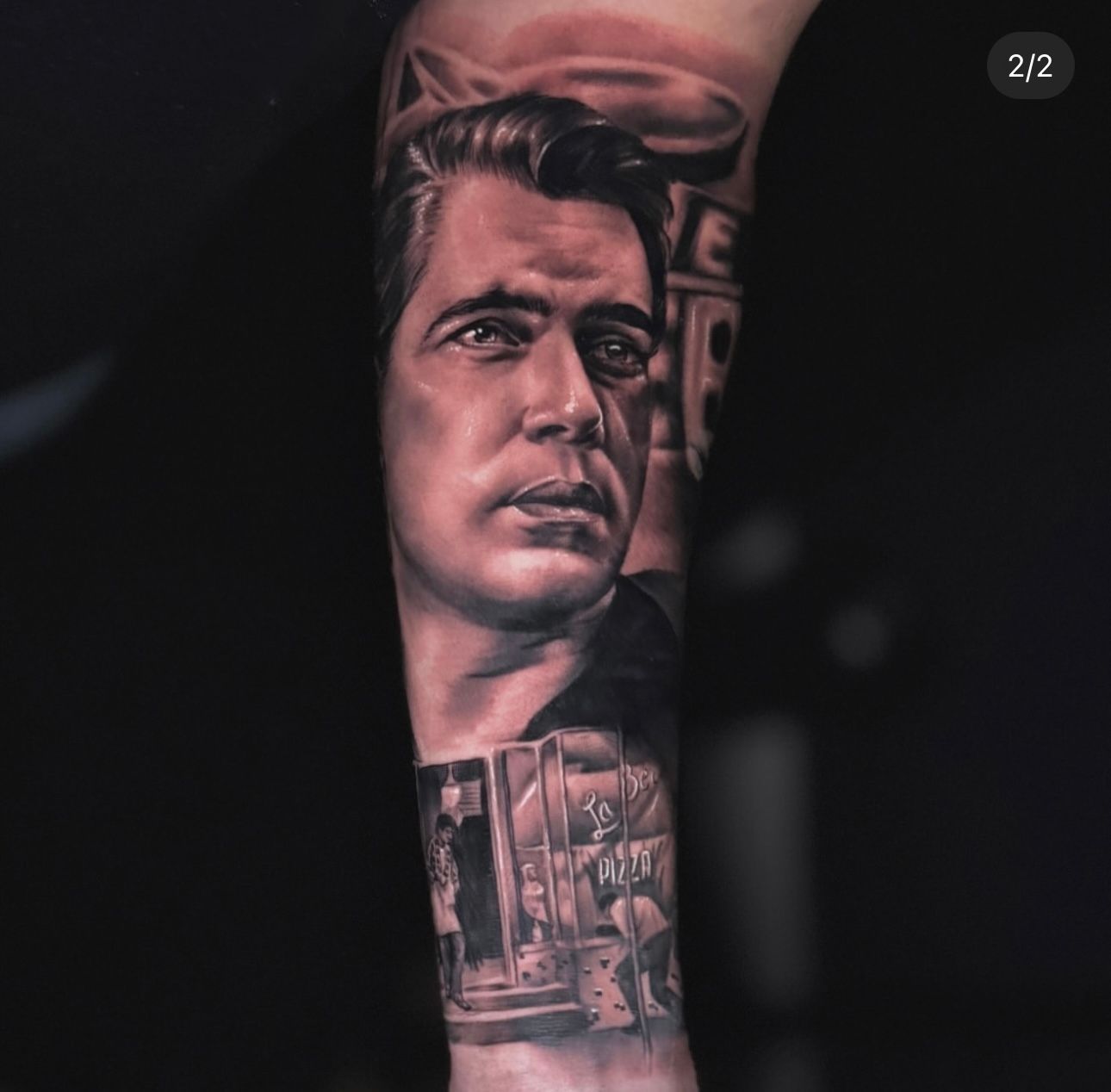 Healed portrait tattoo detail in black and grey realism
