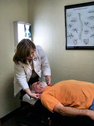 Chiropractor With Client — Beaumont, TX — Gulf Coast Chiropractic