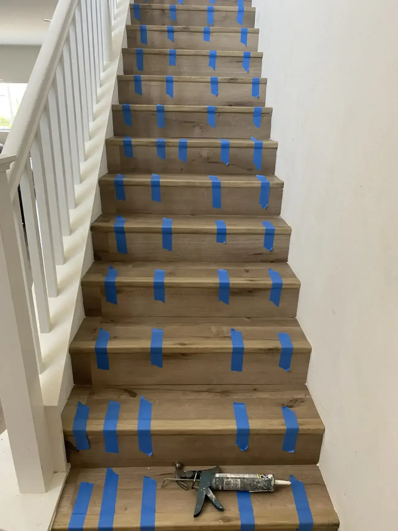 Newly installed hardwood flooring on stairs