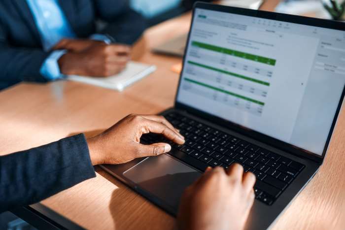 Man working at computer | Featured image for the SME Accounting Services page of Rudd Mantell Accountants.