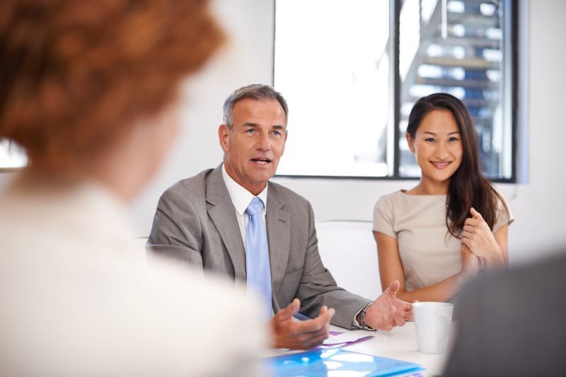 Business professionals in a meeting | Featured image for the Business Services page for Rudd Mantell Accountants