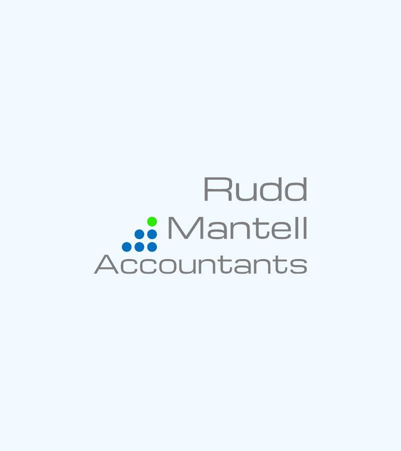 People looking over financial documents | Featured image for the SME Accounting Services page of Rudd Mantell Accountants.