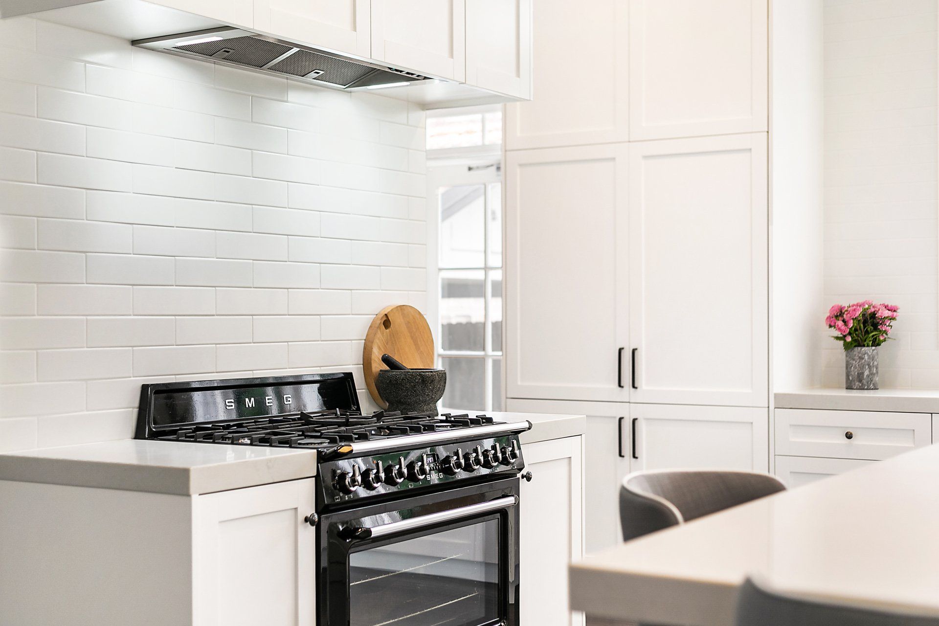 modern white kitchen at McCourt Building's Ann Street project