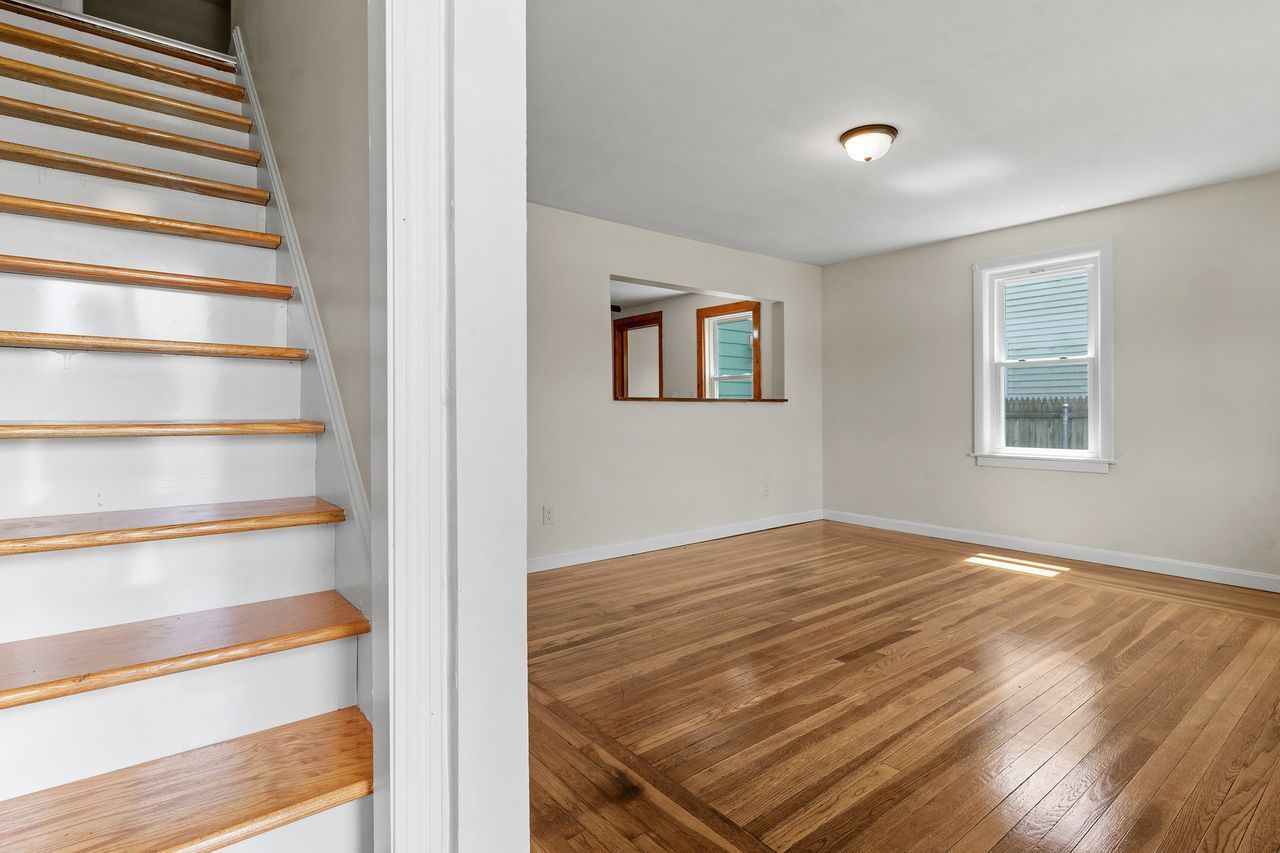 Living Room Next to the Stairs | Providence, RI | Divine Investments