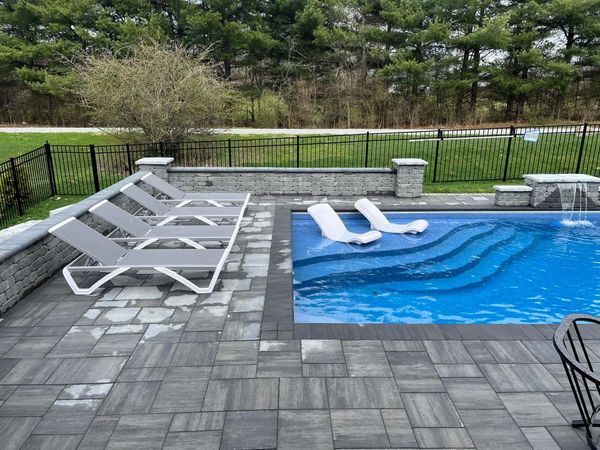 Pool Chairs On A Swimming Pool - Delaware, OH - Outdoor Living Pools & Patio