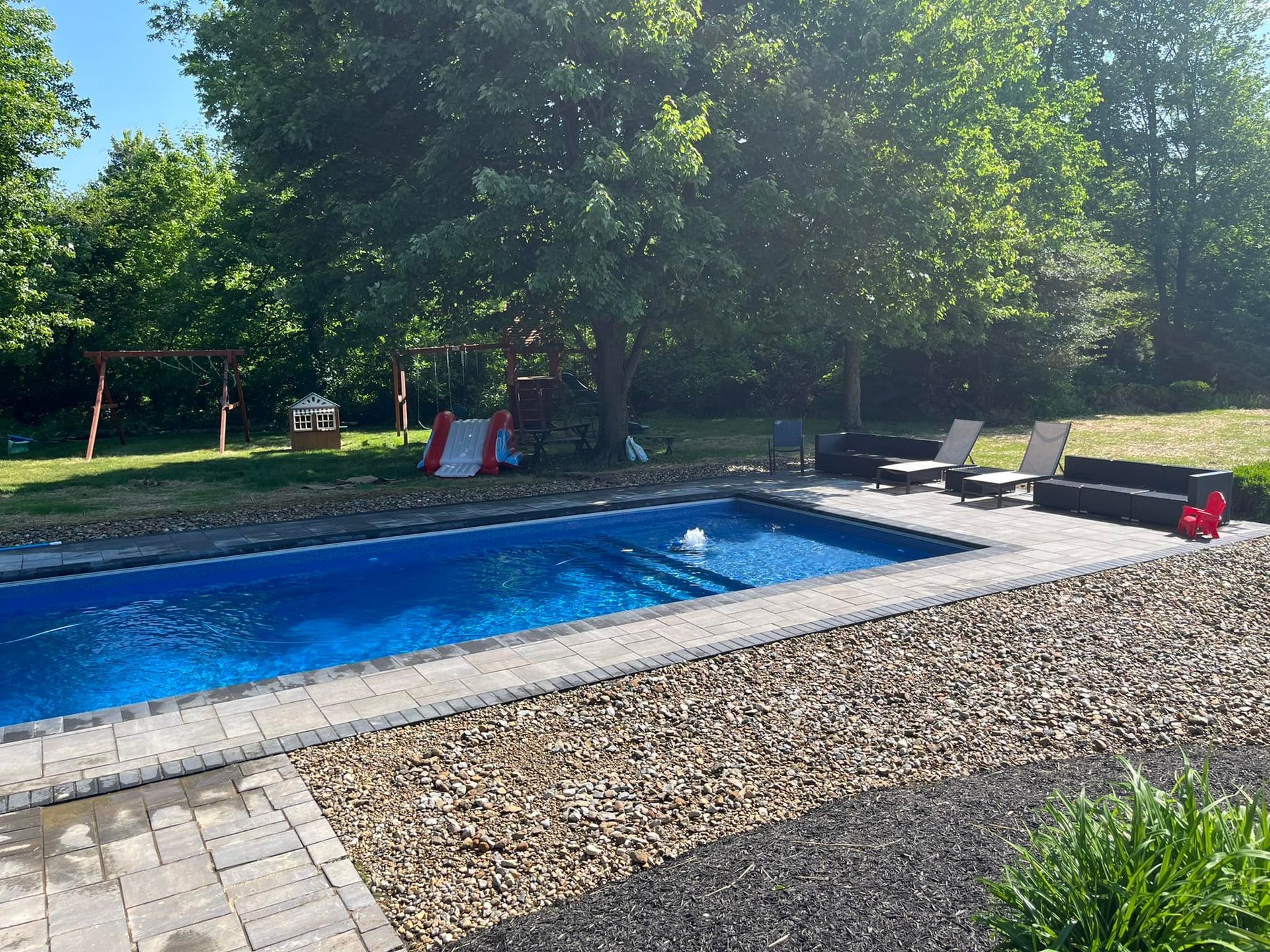 Sunbeds And Sofa Near The Swimming Pool - Delaware, OH - Outdoor Living Pools & Patio