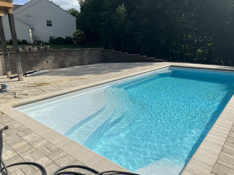 Wave Shape Stairs Under The Pool - Delaware, OH - Outdoor Living Pools & Patio