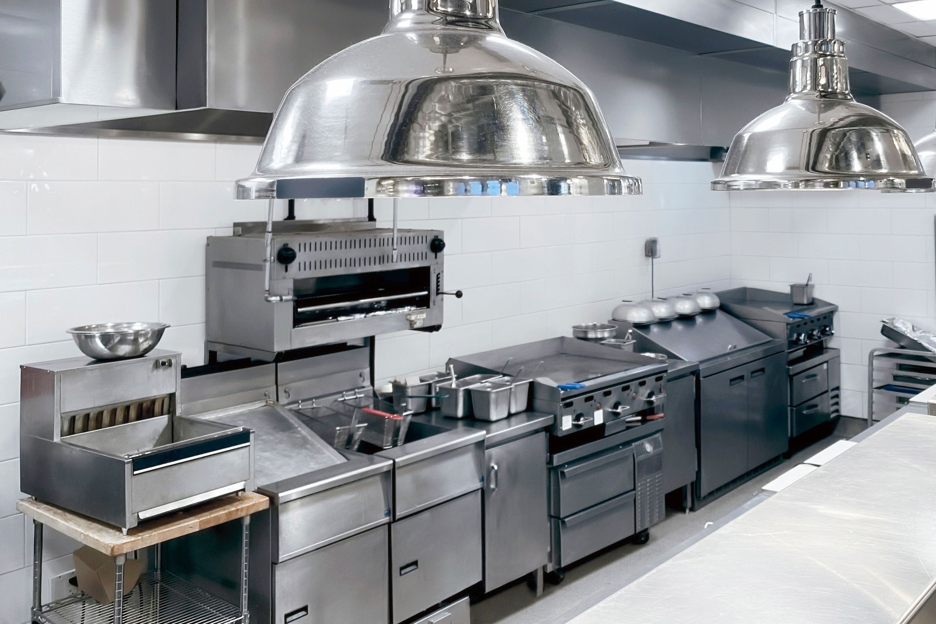 A kitchen with a lot of stainless steel appliances
