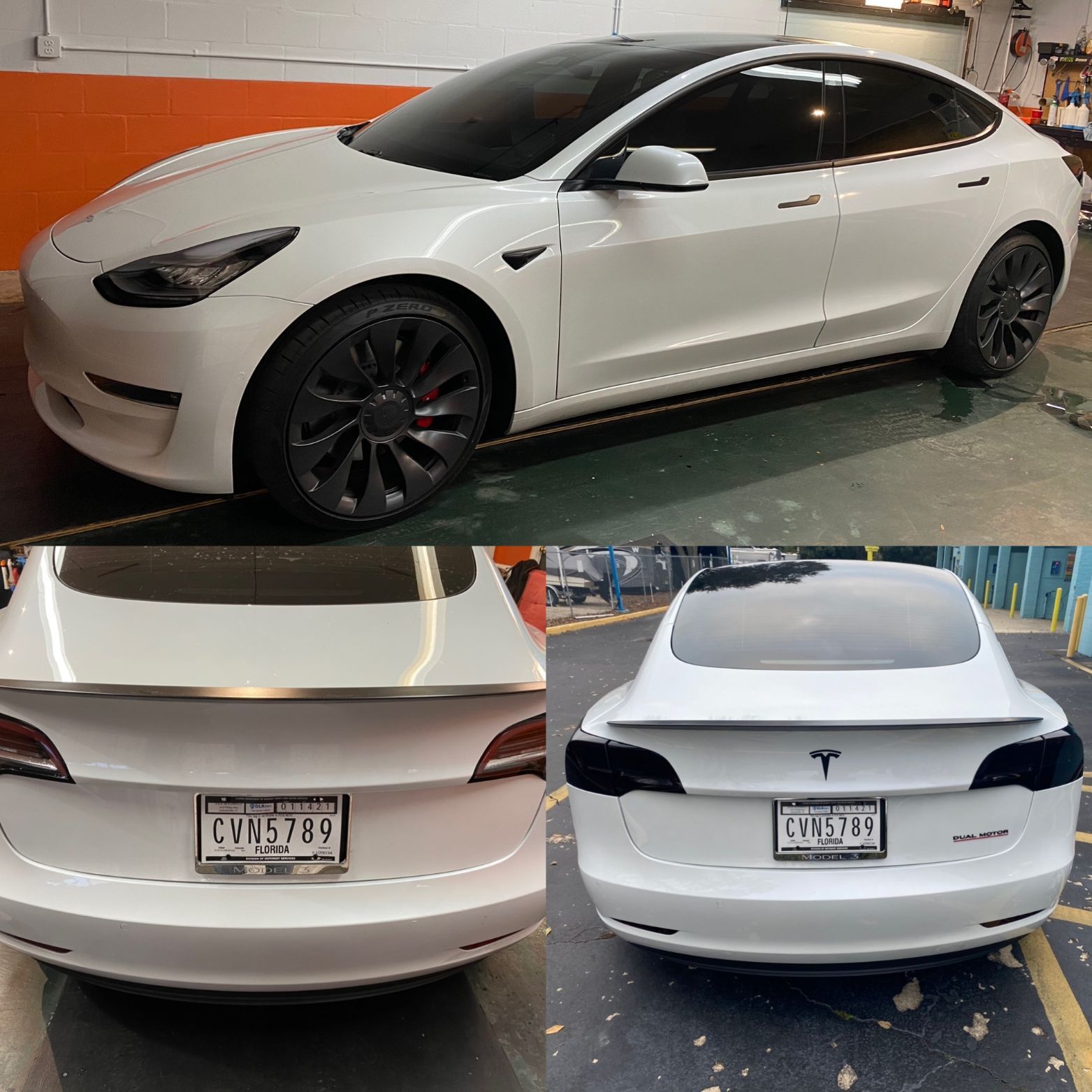 A white tesla model 3 is parked in a garage