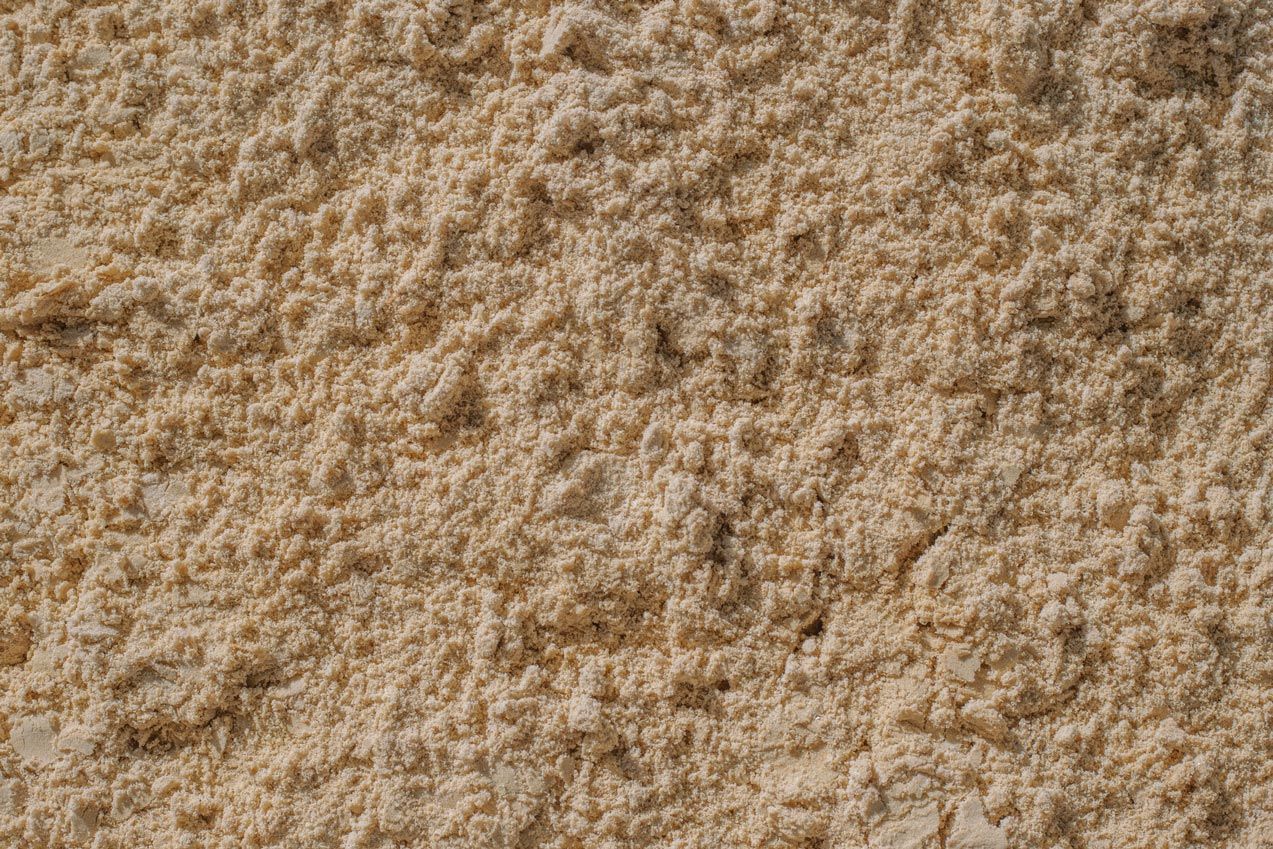 A close up of a pile of sand.
