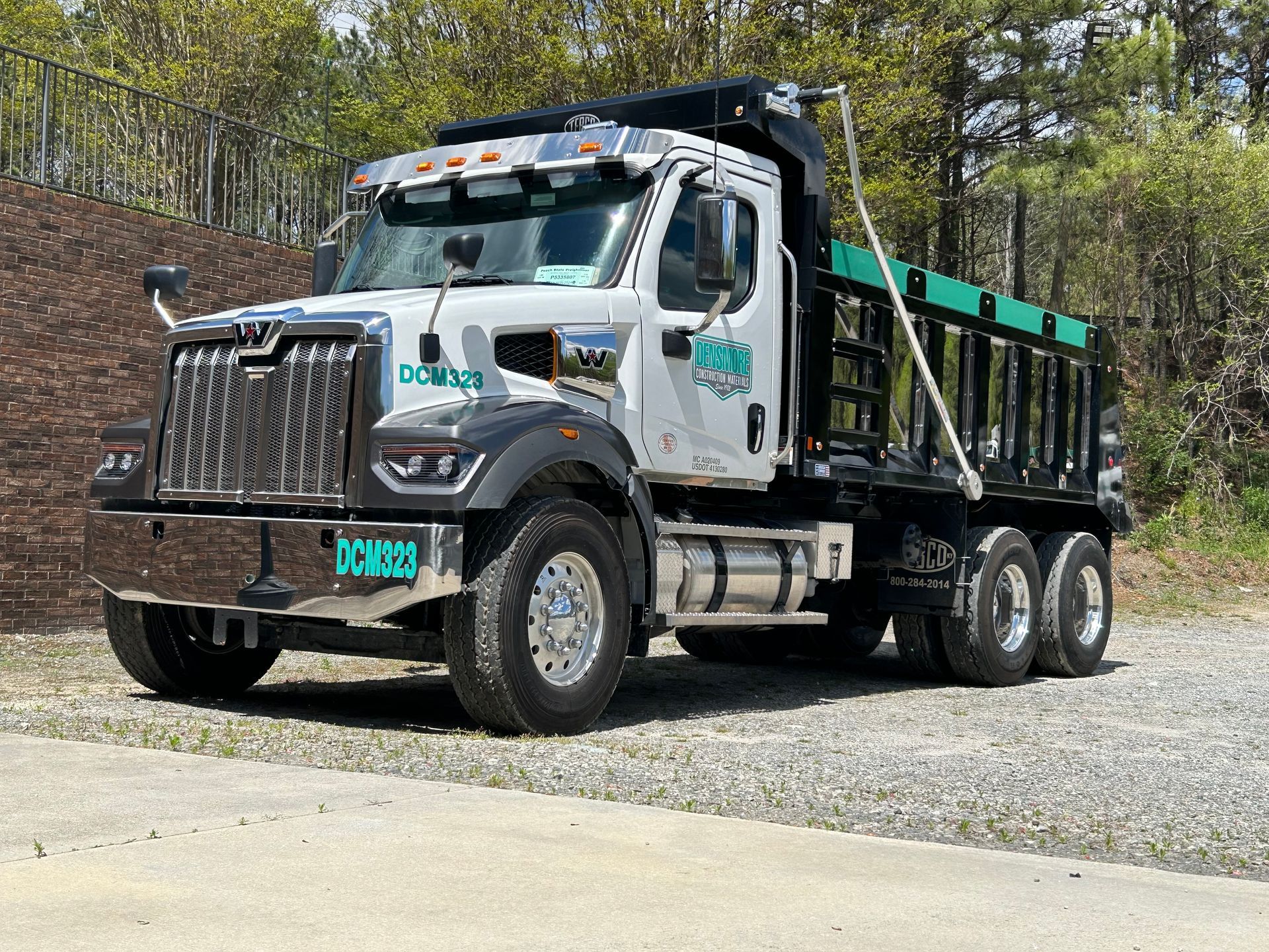 A large pile of dirt is sitting in the middle of a desert.