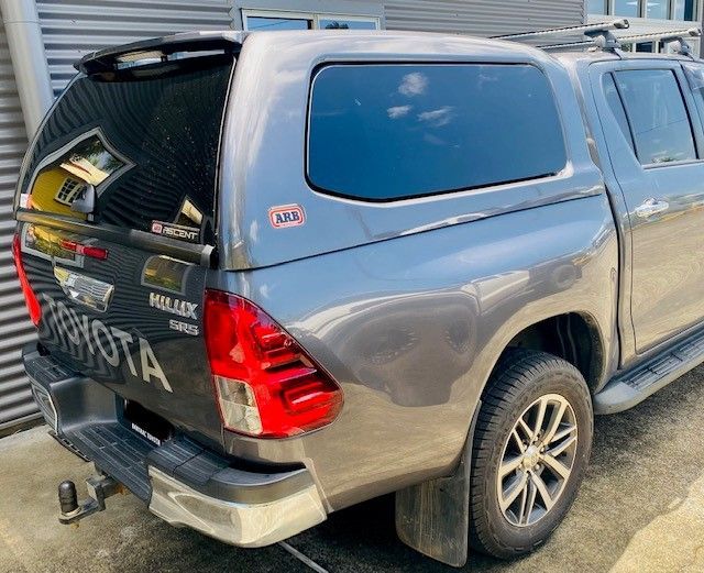 A Toyota Hilux Truck Is Parked In Front Of A Building — Tech Tune Automotive and 4x4 ARB In Babinda, QLD